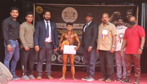 A photograph of Praveen Nath after his victory in the Mr Thrissur competition