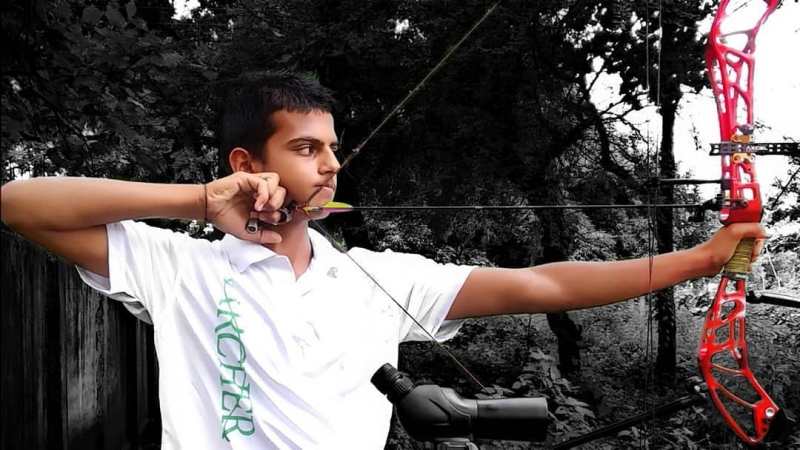A photo of Prathamesh Jawkar practicing archery in his childhood