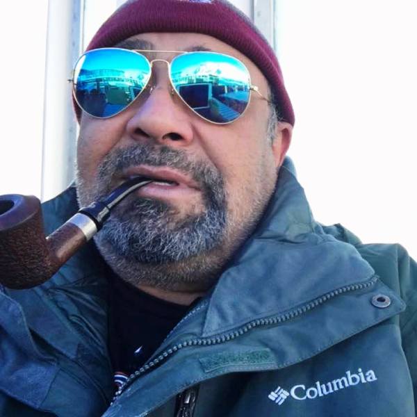 A photo of Rajiv Luthra taken while he was smoking his pipe
