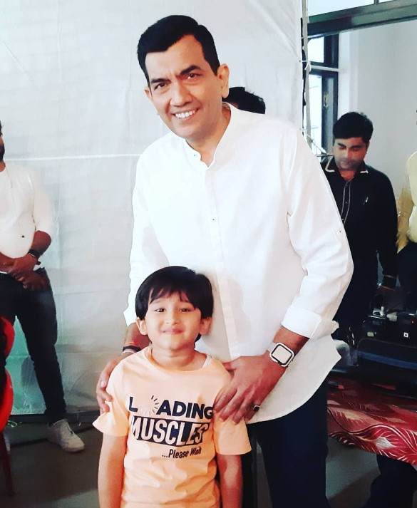 Angad Maholay with Chef Sanjeev Kapoor during the shoot of an advertisement