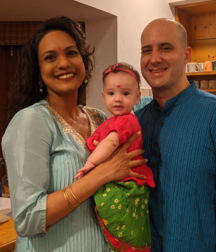 Ashwin Mushran with his wife and daughter 