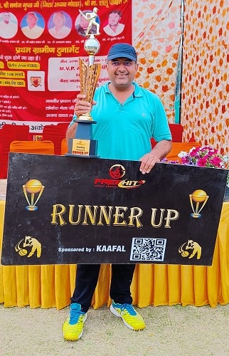 Atul Agrawal with his cricket match trophy
