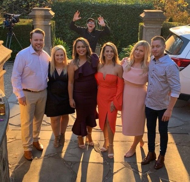 Dannii Erskine (second from left) with her ex-husband, Denton Ansley (extreme left) and other participants of the 2019 Bride and Prejudice reality TV show