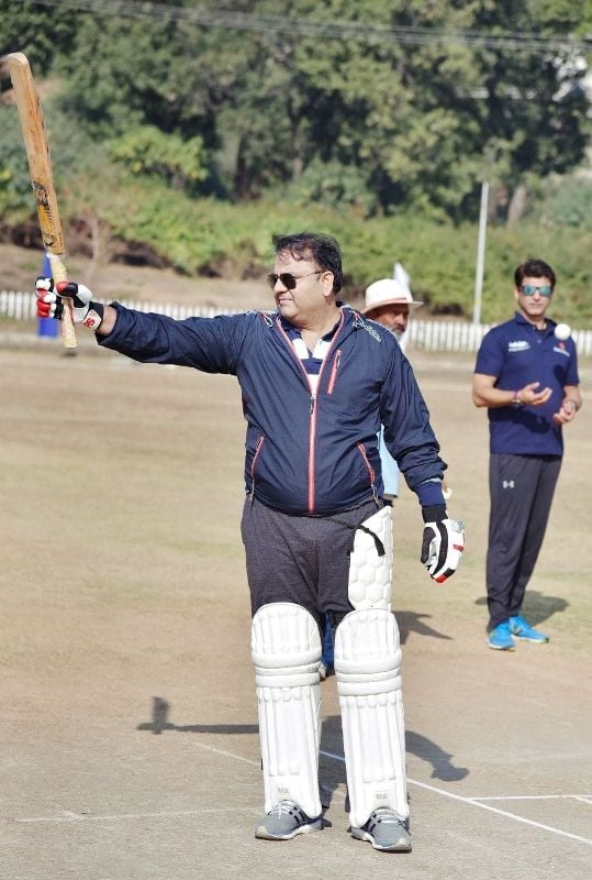 A photo of Fawad Chaudhry playing cricket