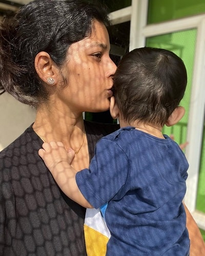 Kanchan Dogra Negi with her son