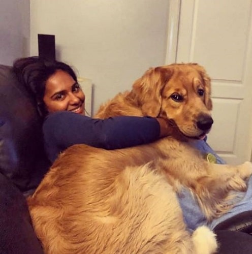 Lakshmi Priyaa Chandramouli with a dog