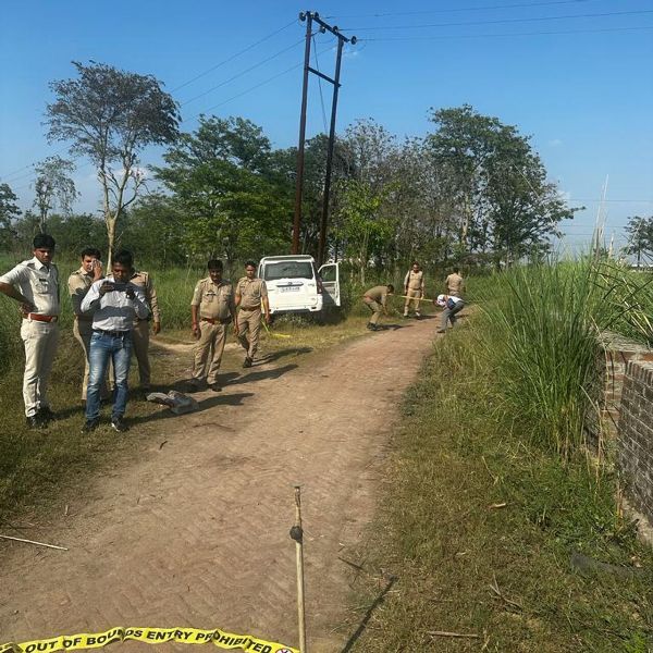 Police officials at Anil Dujana's encounter spot in Uttar Pradesh