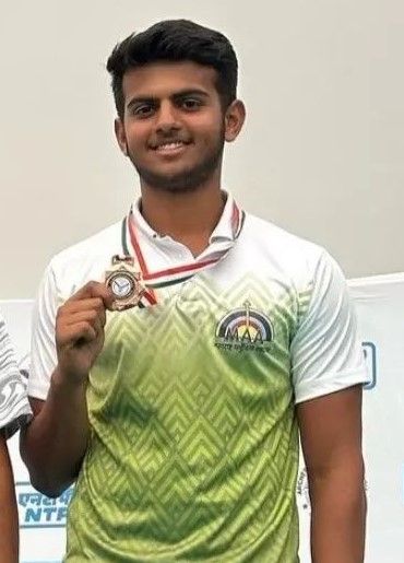 Prathamesh Jawkar after winning a bronze medal in a tournament