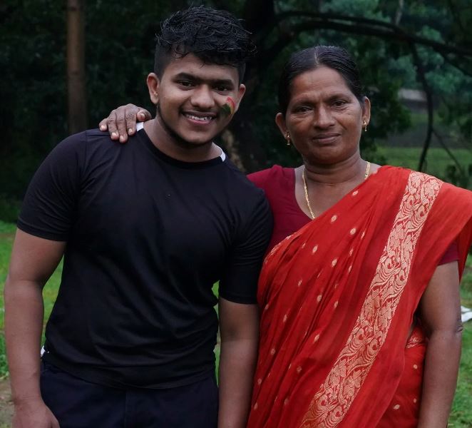 Praveen Nath with his mother
