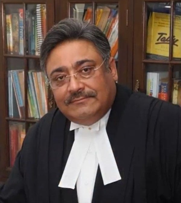 Rajiv Luthra sitting in his chamber in the Supreme Court