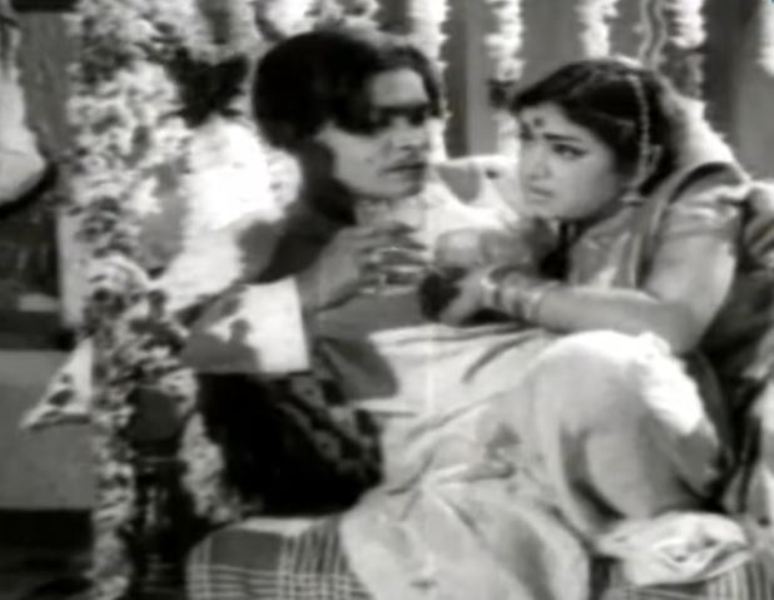 Rama Prabha and Raja Babu in a still from the Telugu film 'Akhandudu' (1970)
