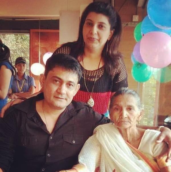 Sanjeev Tyagi with his mother (sitting)