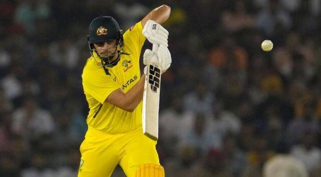 Tim David playing a shot during the first T20 cricket match between India and Australia in 2022