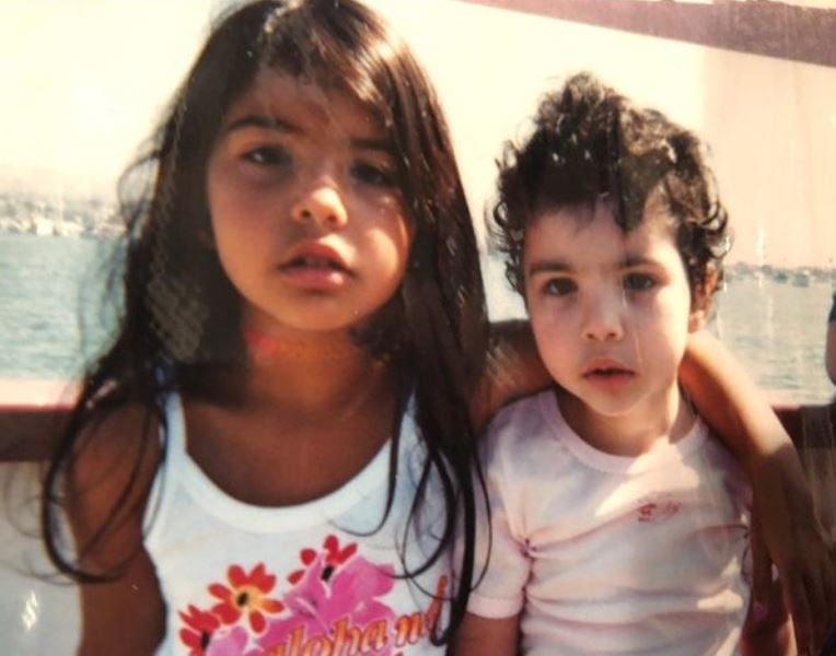 A childhood image of Noor Alfallah with her younger sister