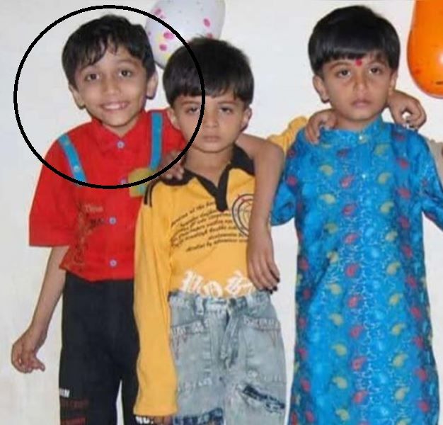 A childhood image of Prem Shilu with his friends