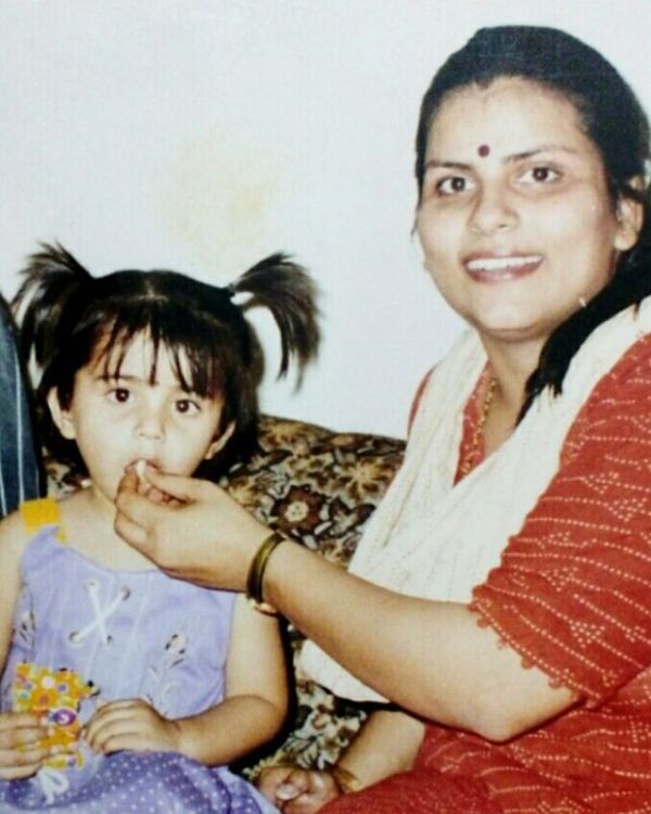 A childhood picture of Tina Shilparaj with her mother