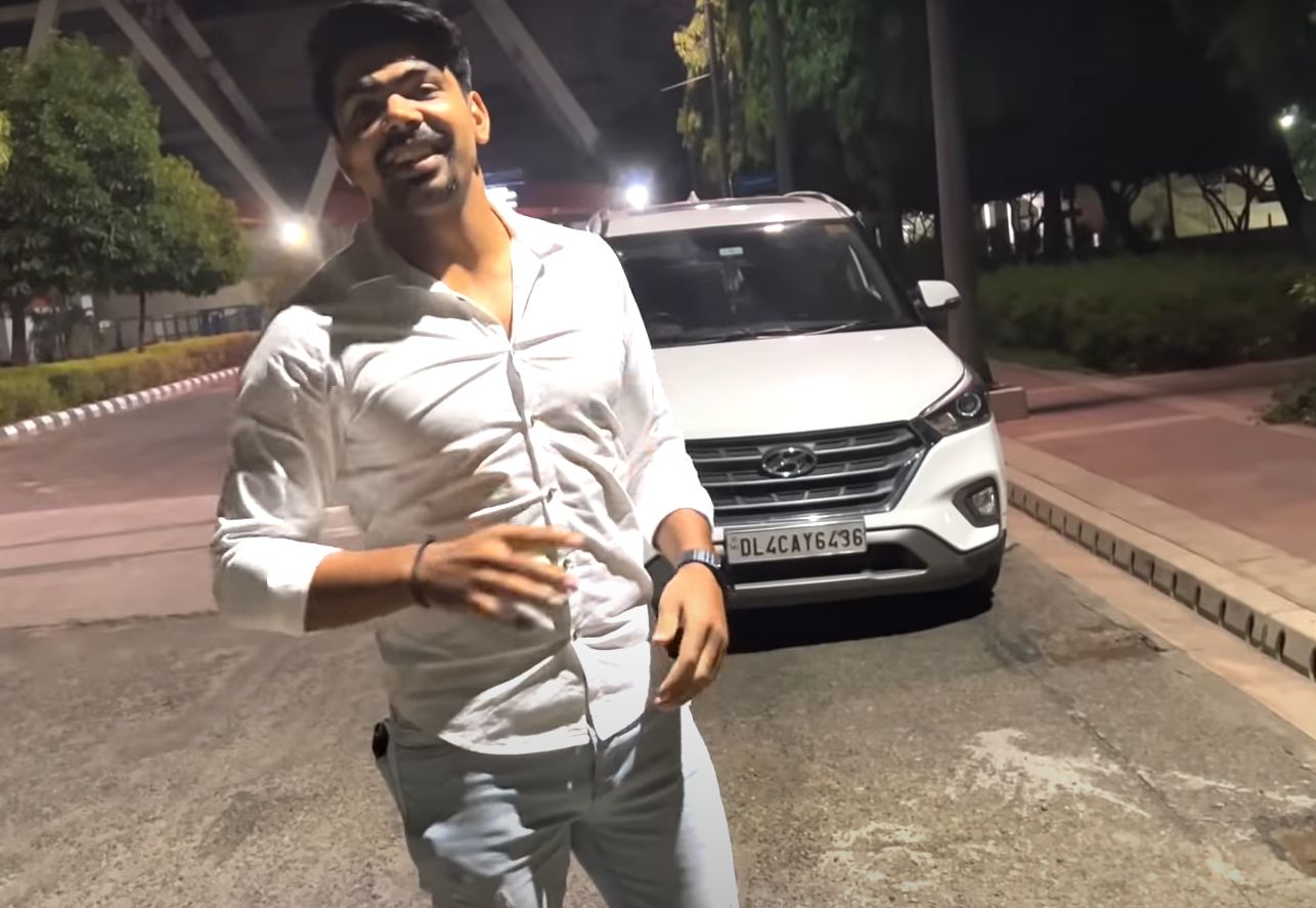 A picture of Pawan Sehrawat with his car