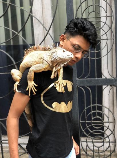 Abhirup Kadam and his pet iguana