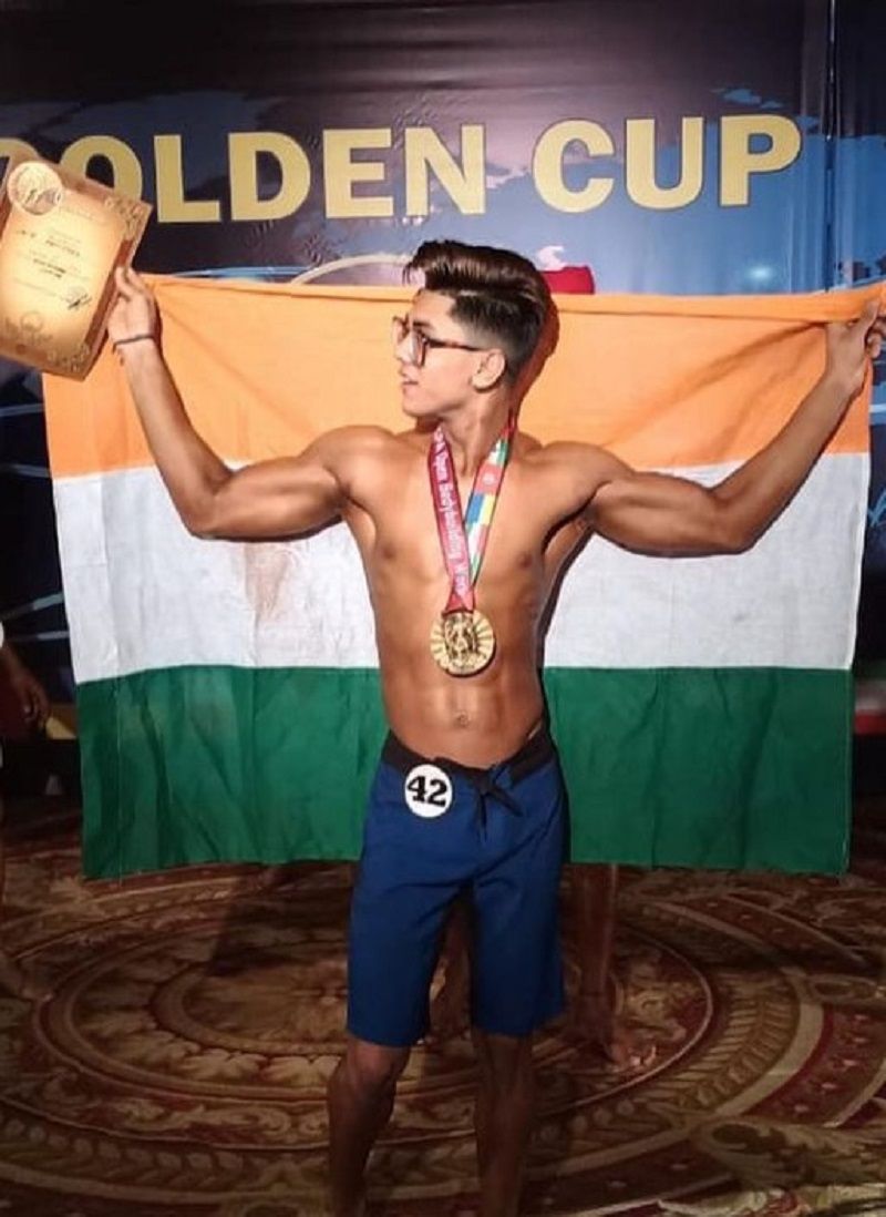 Addy Jain holding the GPA World Cup Award