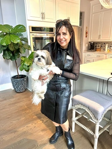 Aisha Pirani with a dog