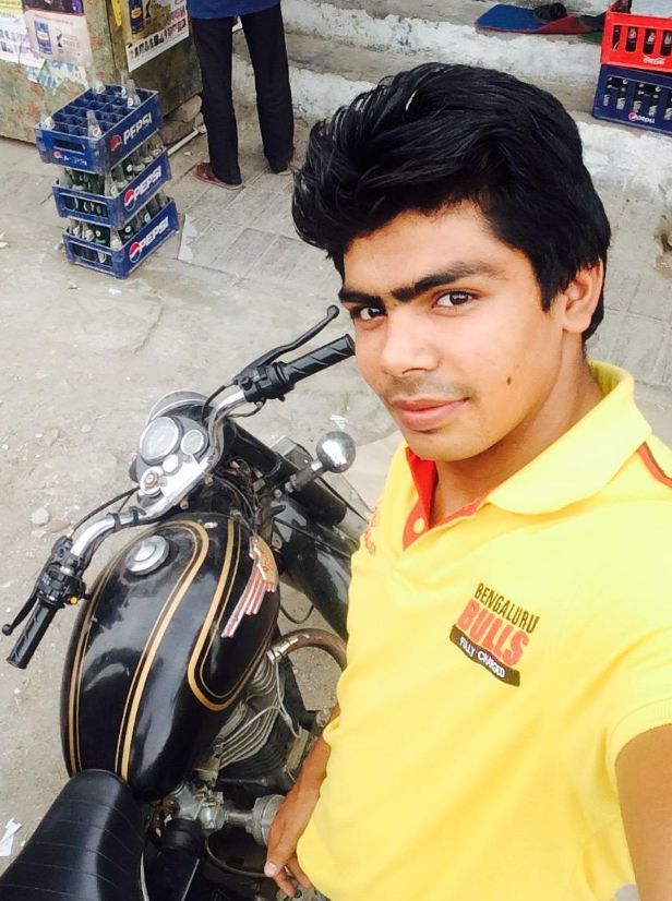 An old picture of Pawan posing with his bike