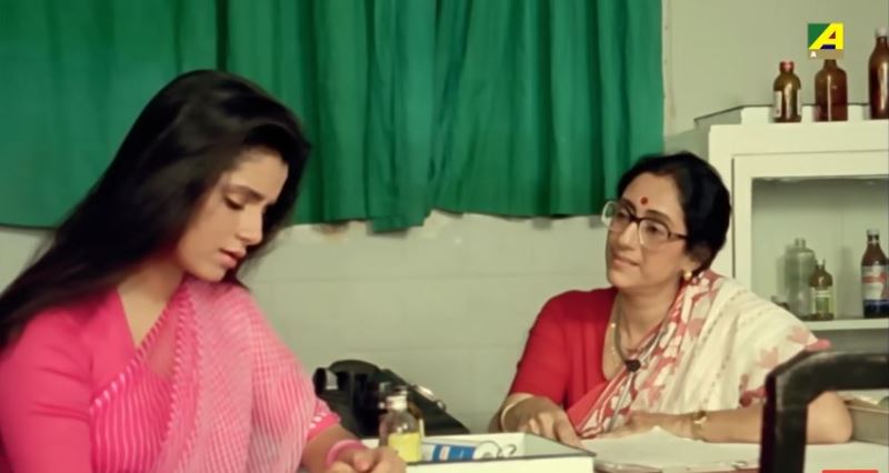 Asha Sharma in a still from the 1990 Bengali film 'Badnam'