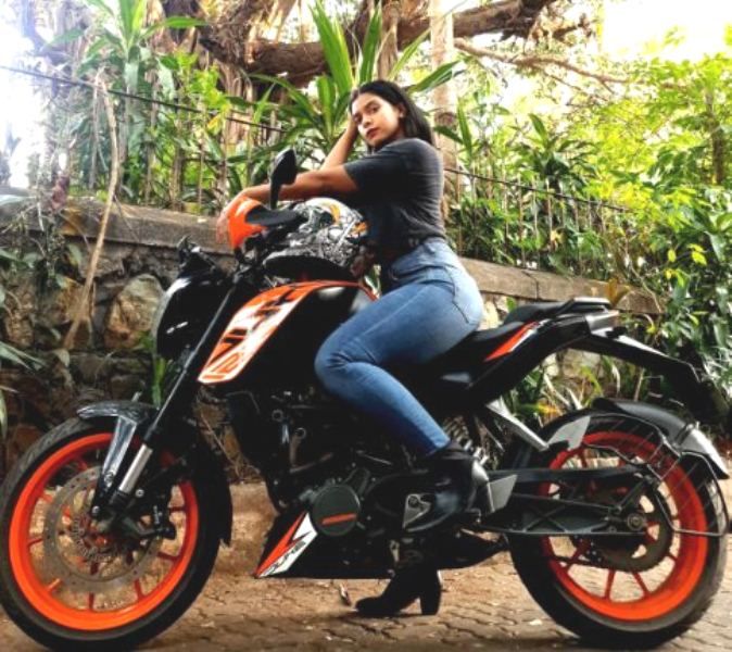 Ashika Surve with her bike