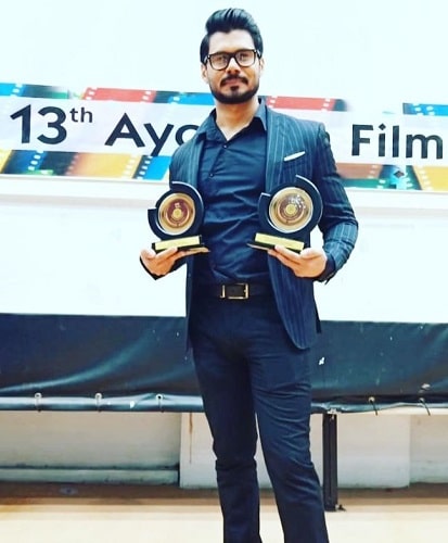 Avinash Dwivedi with his awards
