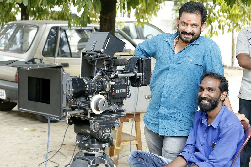 Baiju Paravoor (left) during the shoot of a film