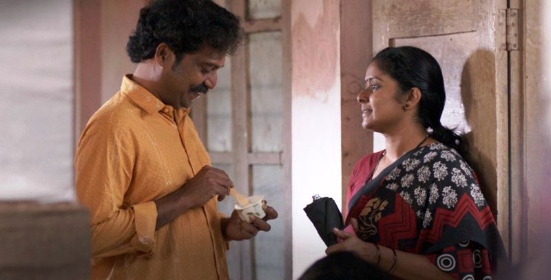 Guru Somasundaram as Shibu and Shelly Kishore as Usha in Minnal Murali (2021)