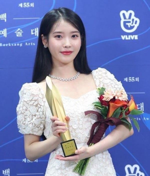 IU with Best Actress Award at the Baeksang Arts Awards
