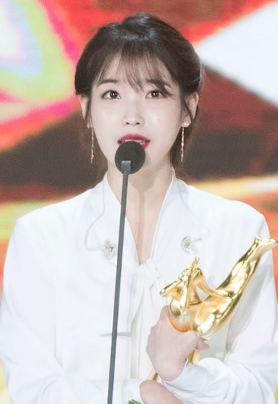 IU with Digital Daesang Award at the Golden Disc Awards 2018