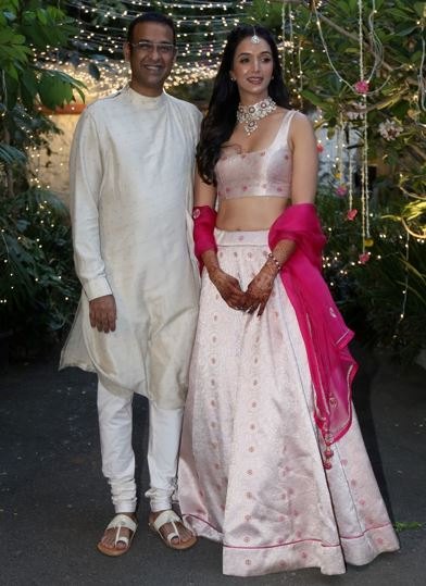  Madhu Mantena with his wife, Ira Trivedi