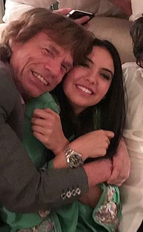 Noor Alfallah with Mick Jagger