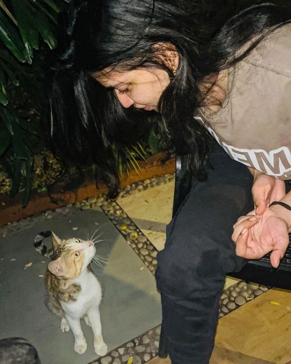 Priyanka Gupta with a cat