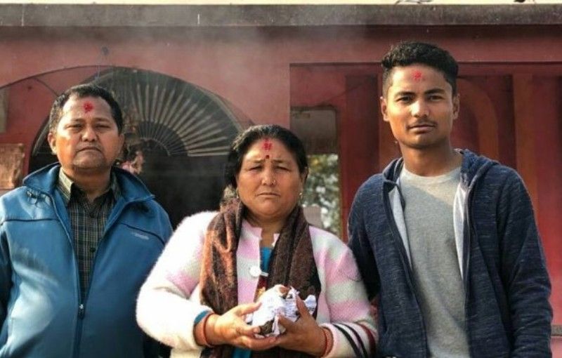 Rohit Paudel with his father, Kumar Paudel (left) and his mother, Paljesh Paudel
