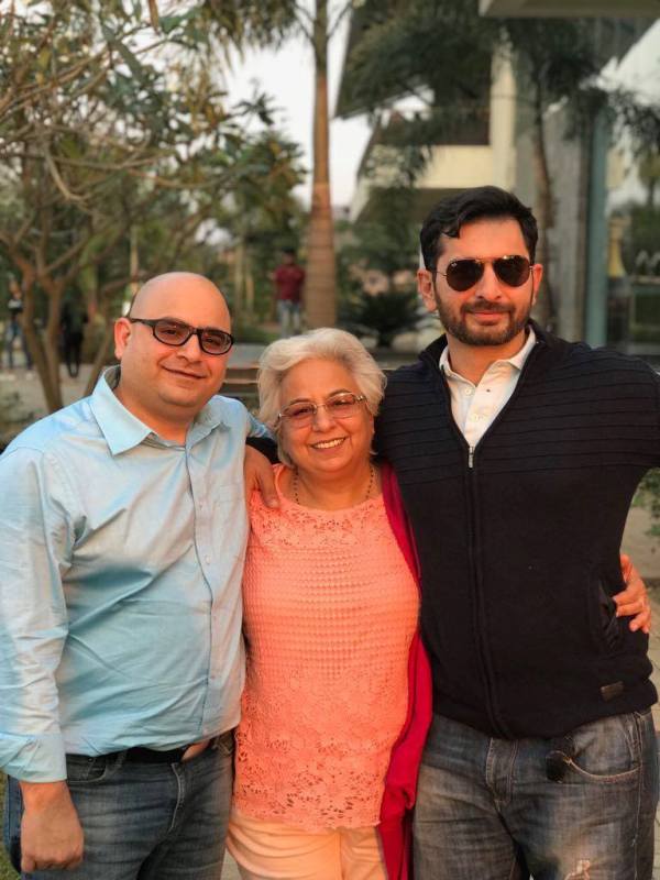 Siddhant Karnick with his mother and brother