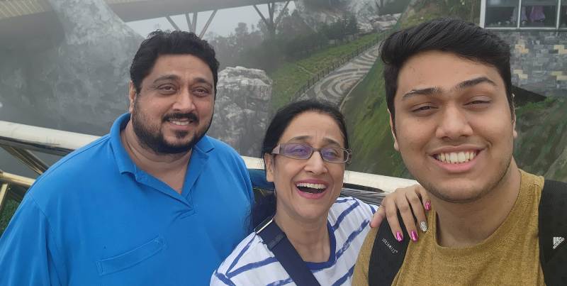 Smeep Kang with his wife, Parnit Sarkaria Kang (centre) and son, Kairav (right)