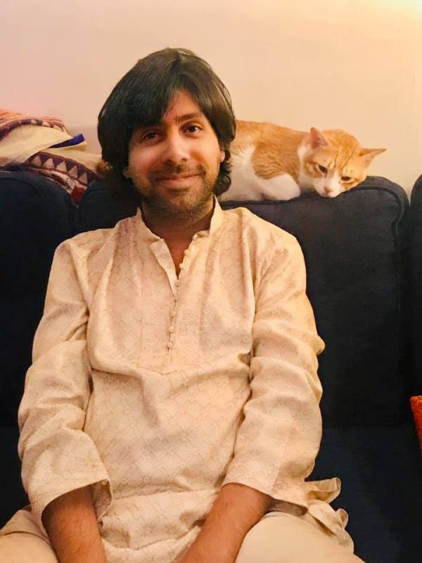 Tanveer Bookwala with his cat