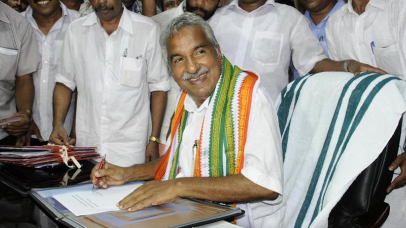18 May 2011: Oommen Chandy assuming office as the Chief Minister of Kerala after the swearing-in at the Secretariat building in Thiruvananthapuram, Kerala