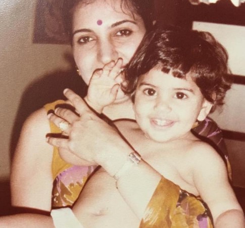 A childhood picture of Parizad Kolah with her mother