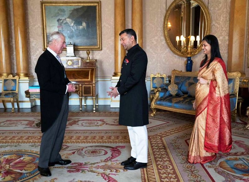 A picture of Indian High Commissioner to the UK Vikram Doraiswami presenting the Letters of Commission to Britain's King Charles during an audience at Buckingham Palace in 2022