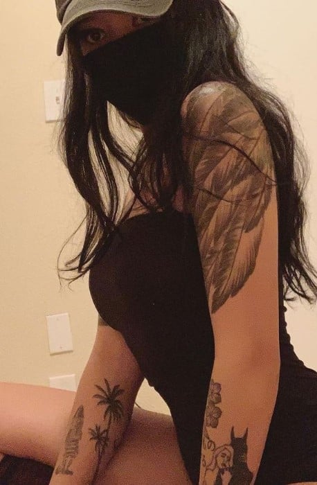 Bella Poarch side arm tattoo