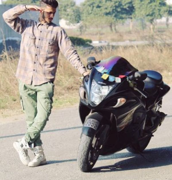 Bhawish Madaan with his bike 