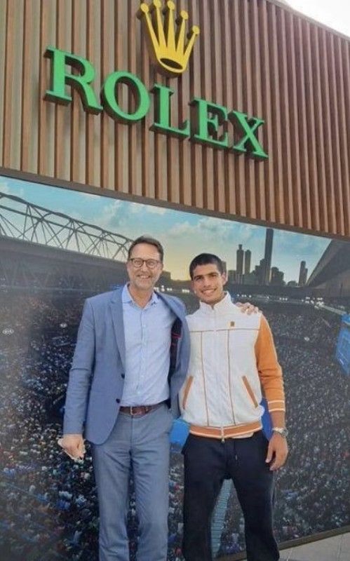 Carlos Alcaraz (right) at Rolex headquarters after signing as their Brand Ambassador