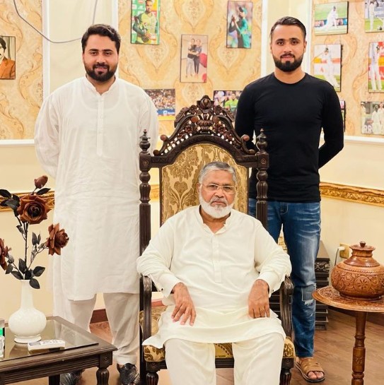 Faheem Ashraf with his father (sitting) and eldest brother