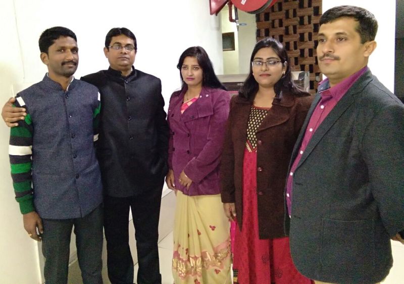 Jyoti Maurya (second from right) with other government officials