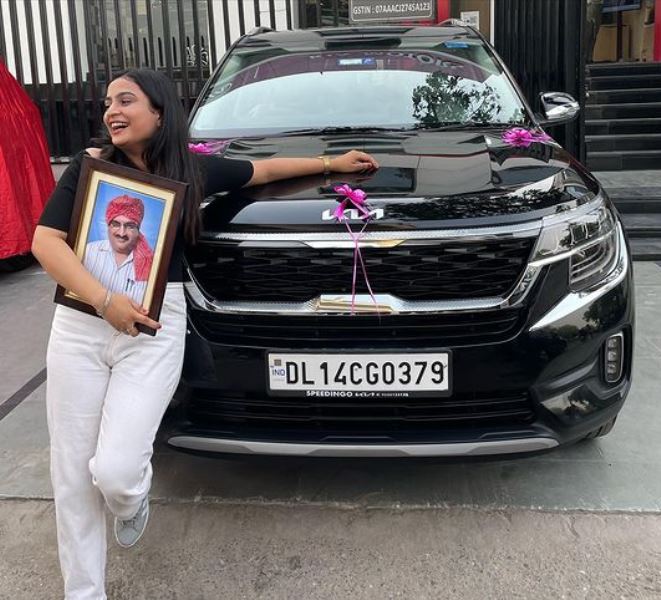 Kirti Mehra with her Kia Seltos car