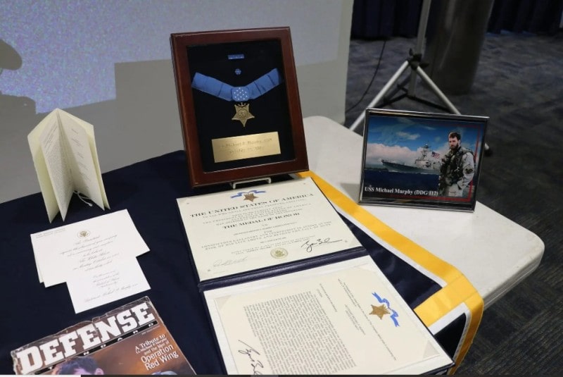 Michael's Medal of Honor medal and its citation