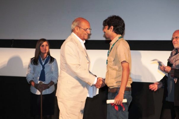 Pushpendra Singh getting honoured at an international film festival